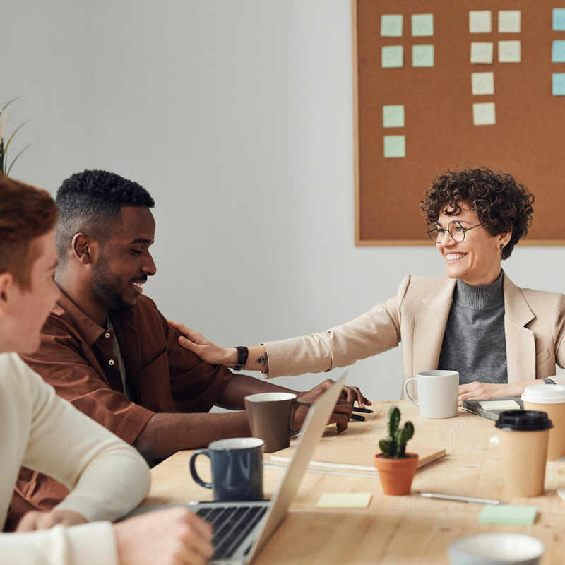 People smiling at business, workplace neuroinclusivity, California